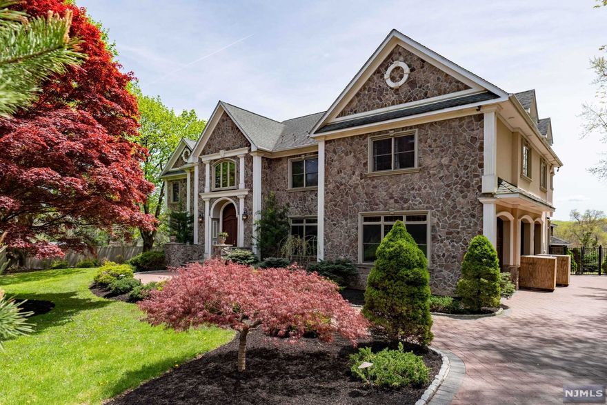 Custom home with Cherry, Marble and Granite floors, Striking and elegant front entrance foyer with custom chandelier. Large kitchen, formal dining room, billiards room. 2 master suites, guest suite in lower level with separate entrance. Pool house with possible kitchen, full bath and a BBQ area. Inground pool with hot tub overlooking the beautiful landscape. 3 car garage with granite floors. Stable with 2 stalls (in disrepair). Radiant heat in part of the house.