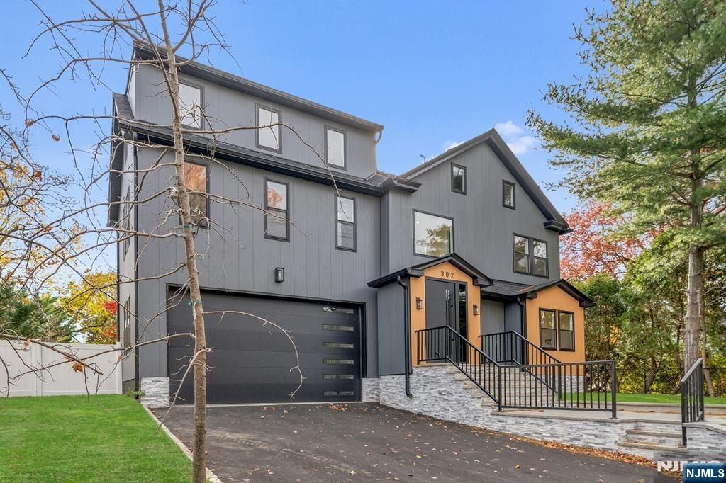 Photo of 302 W Clinton Avenue, Tenafly, NJ 07670 (MLS # 25039834)