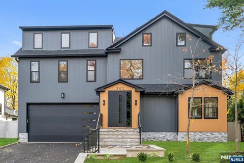 Photo of 302 W Clinton Avenue, Tenafly, NJ 07670 (MLS # 25039834)