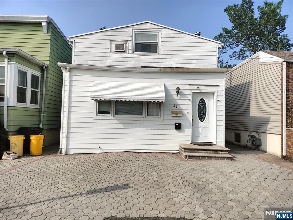 Photo of 411 Sheridan Place, Fairview, NJ 07022 (MLS # 25022096)