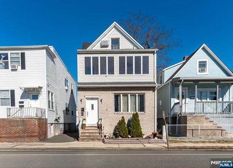 Photo of 118 Ray St, Garfield, NJ 07026 (MLS # 26007688)