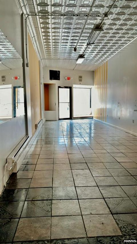 Photo of 12331247 Main Avenue #1241, Clifton, NJ 07011 (MLS # 26008365)