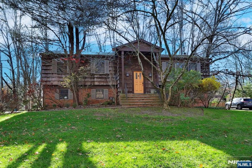 First time on the market. Oversized Bi-Level located in highly desirable Closter on a beautiful park-like property. Solid construction with great bones, offering an excellent opportunity for buyers looking to update and renovate to their own style. Main level features spacious rooms, large windows, and great natural light. Lower level includes additional living space with many layout possibilities. Well-maintained by original owners. Ideal for those seeking size, location, and potential in one of Closterâ€™s most sought-after neighborhoods.