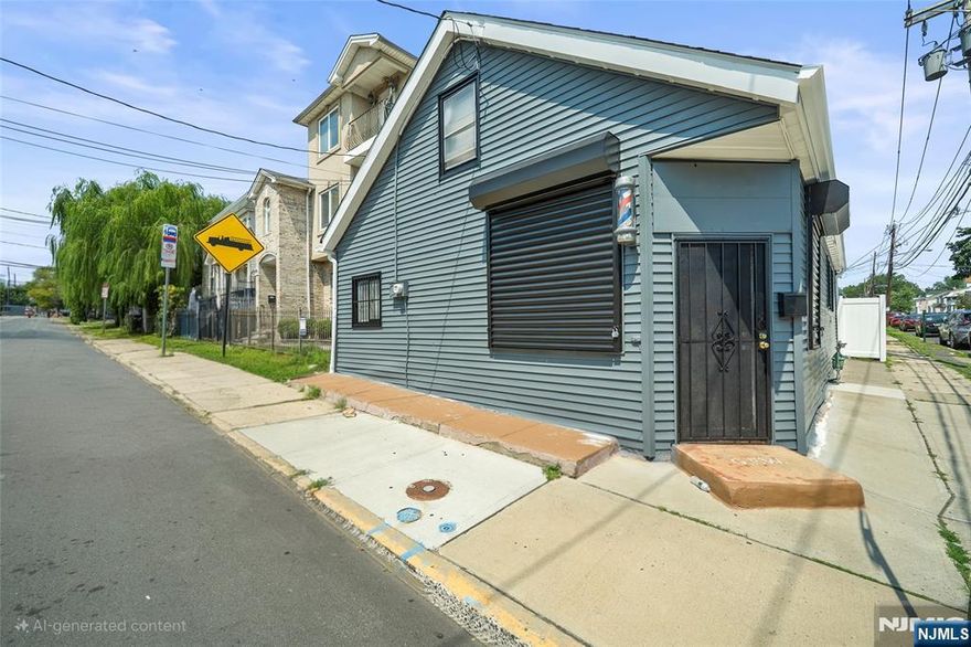 Prime Investment Opportunity â€“ Mixed-Use with Dual Rental Potential! Welcome to 339 Hillside Avenue! This versatile mixed-use property offers endless potential with its current setup as a barber shop with a private half bathroom and a 1-bedroom apartment, all on one level. With two separate entrances, itâ€™s perfect for rental income or an owner-occupied live/work arrangement. The home includes a full basement for storage and sits on a corner lot that provides excellent visibility and steady foot traffic. A fenced-in off-street yard offers rare private parking in the area, while the 10 ft ceilings enhance the sense of space and character. Conveniently located near major highways, shopping, schools, and public transportation. Property is being sold as-is, where-is, priced to sell and ready for your updates. Donâ€™t miss this great investment or live/work opportunityâ€”schedule your showing today!
