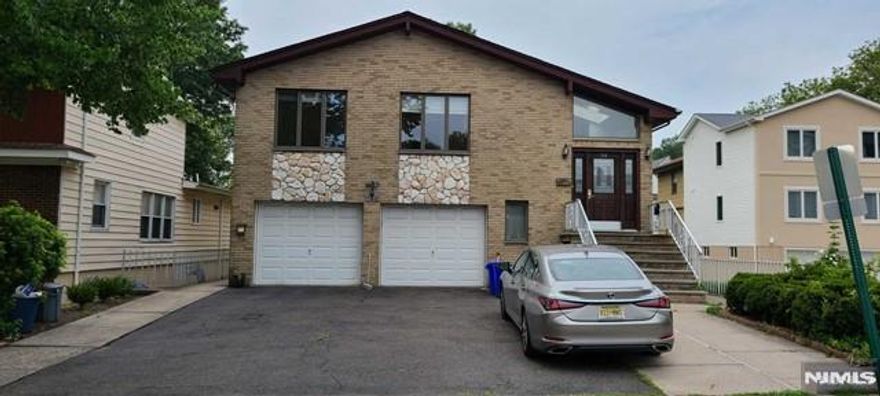 Very spacious and bright 2family house with all brick. 3bed room,2full bath, formal dining room, big kitchen and all hardwood floors in 2nd floor. 2bedroom and one full bath in 1st fl. one bedroom and a full bath with separated entrance in 1st floor is connected with 2nd fl. There is no basement.