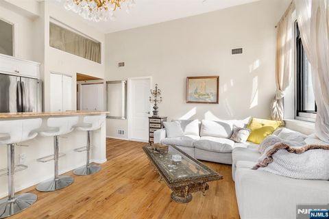 Photo of 518536 Gregory Avenue #C408, Weehawken, NJ 07086 (MLS # 25014156)