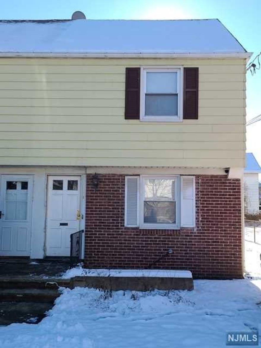 This 1/2 of a fourplex features 2 units with hardwood floors throughout & galley kitchens with gas stoves. Second floor has access to staircase from living room to 3rd floor unfinished room with plenty of storage space. Backyard surrounded by chain link fence. Front outside access to basement with separate boilers & hot water heaters. 2 car tandem driveway parking.