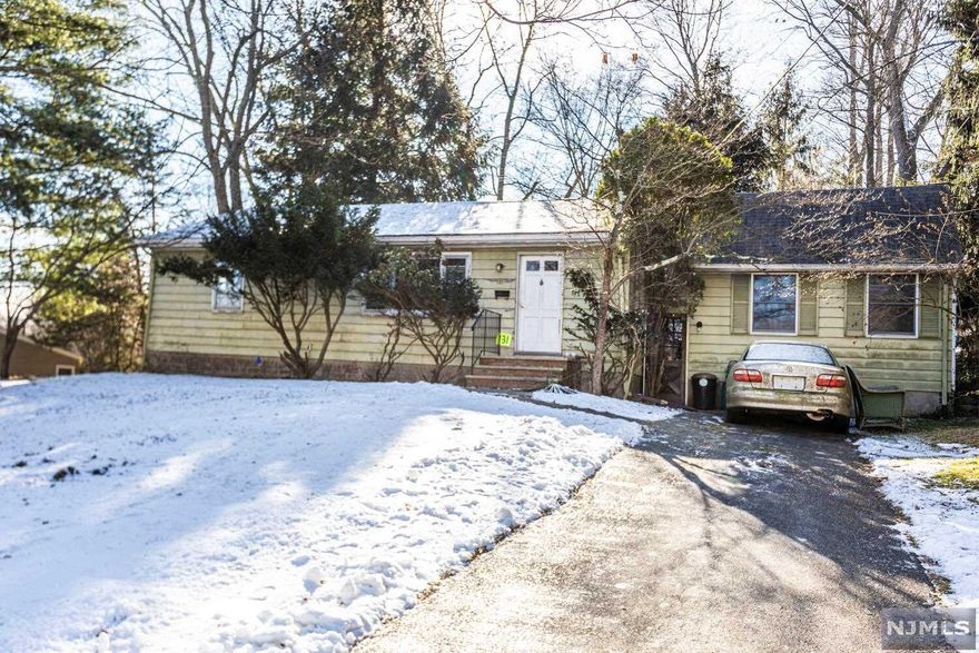 Great Opportunity to purchase this 4 Bed 1.5 bath ranch with private yard in beautiful neighborhood. One floor living includes large LR, EIK with fireplace and laundry. Full Unfinished basement. Perfect for remodeling or expansion or quiet street with homes of greater value. Convenient to top-rated PR schools town pool, and NY transportation.