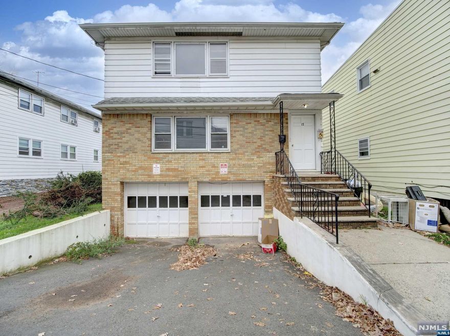 A two family home completely vacant with the opportunity to occupy the entire property or choose your own tenants doesn't come as often. Here is your opportunity to purchase a 6 bedrooms and 2.5 bathrooms in popular city of Essex County. Hardwood floors throughout the property, spacious bedrooms, great conditions on kitchen/bathroom and much more. Each floor offers 3 bedrooms and one full bathroom. Owner has built a fence in between the backyards for each floor to have their own private section. Ground level offers an open space ready to be finished along with a half bathroom. Property features a two car garage, and two car driveway. Do not miss out on this great home!