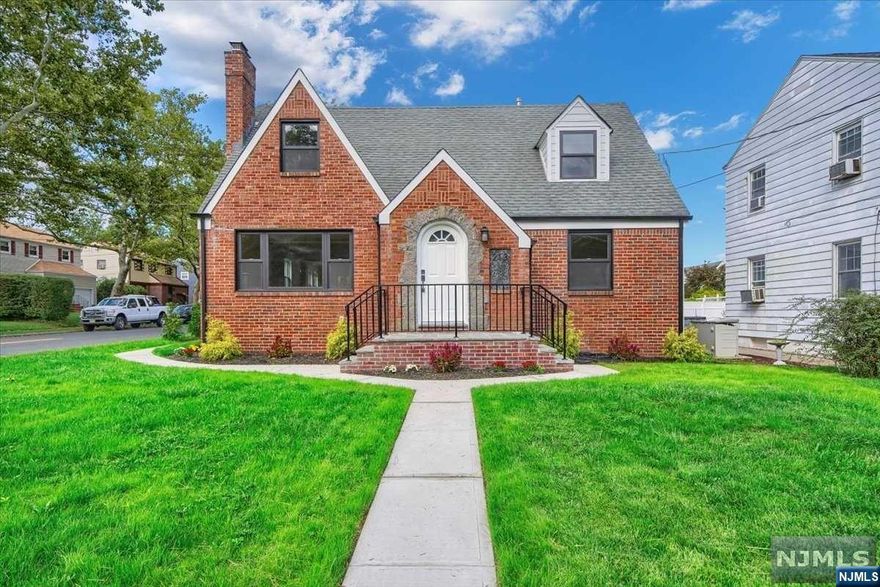 Introducing a TRUE move-in ready gem in sought after Teaneck! Attention to detail is evident throughout this tasteful and impeccably renovated home. The open concept floor plan and gorgeous hardwood floors usher you through a spacious living room, with wood burning fireplace, and beyond, to the sophisticated chef's kitchen. Oversized sliders in the family room bathe the room in natural light, and lead to the private backyard oasis. Three spacious bedrooms and baths, including a highly sought after first floor bedroom and full bath, as well as a home office, and finished basement, elevate this home to next level living. Convenient to schools, parks, Holy Name Hospital, houses of worship and, of course, NYC, now is your chance to join this vibrant community.