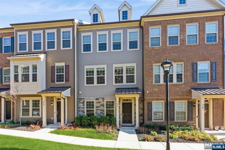 The Best of Both Worlds: LOWEST HOA and NEWEST Townhouse Community in DESIRABLE Livingston! 2 Year Young 4 bedroom + 3.5 bath SMART HOME Boasting 2000 sq ft of Living Space plus 2-CAR Garage. This Unit has a Ground-Level Bedroom and Full Bath. Main level OPEN FLOOR PLAN hosts Living Room, Dining Room and CHIC Gourmet Kitchen Design w/Quartz Countertops, Center Breakfast Island and SS Appliances with WALK-OUT to Balcony. 2nd Level: Master En-Suite w/Full Bath & 2 Outfitted Walk-In Closets + 2 Additional Bedrooms w/Full Bath and Laundry. Home features Security System, Hardwired Smart Home & Reverse Osmosis Filtration in Kitchen. TOP RATED School District, Close to Mid-Town Train Free JITNEY and Express NYC Bus.