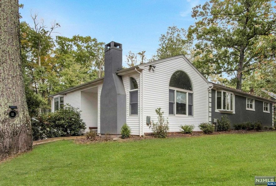 Welcome to this beautifully expanded ranch in sought-after Old Tappan, with a resort-like backyard! Bright, open eat-in kitchen and a banquet-sized dining room, perfect for entertaining. A few steps down, a spacious living room awaits featuring a stunning floor-to-ceiling fireplace and windows. The main level offers a large primary suite with a full bath and generous closet, plus three additional bedrooms, including a second en-suite, and a full bath. The expansive walk-out lower level adds incredible space including a versatile family/recreation room, laundry room, full bath and ample storage. The professionally landscaped property includes a fenced-in backyard with a sparkling in-ground pool, an entertainer's dream. A 2-car attached garage and a long driveway completes this home. This is a rare opportunity to enjoy luxurious living in Old Tappan with lower taxes!