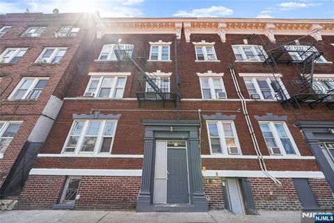 Photo of 59 Henry St #A1, Passaic, NJ 07055 (MLS # 26006231)