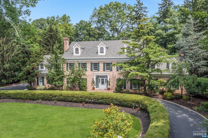 Timeless beauty, fully renovated with no expense spared. Situated on a cul-de-sac among multi-million dollar homes, this classic colonial displays pride of ownership. Welcoming circular drive, 2-story entry leads to ideal entertaining spaces, Signature kitchen with high-grade custom cabinets & appliances, large island, eat-in area overlooking the spa-like pool & yard and a custom office. Phenomenal 2-story great room with gas fpl & wall of glass out to back patio area creates a seamless indoor-outdoor entertainment experience. Upstairs, five bedrooms include a large primary suite with sitting area, walk-in closets, & a lux bath. Below, enjoy movie or sport nights in the vast rec area or in the deluxe professional theatre. Includes fitness & craft room, & lots of storage. Outdoor entertainment is the epitome of this lively home. The tiki bar, heated pool, cabana w/bath, & hot tub ensure guests never want to leave. Come to Upper Saddle River, where convenience meets lifestyle.