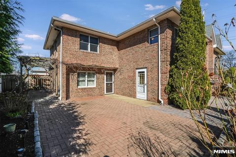 Photo of 402 Monroe Ave, New Milford, NJ 07646 (MLS # 26008962)