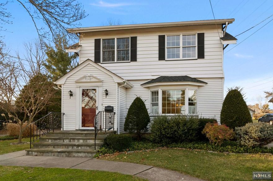 Charming 3 bedroom 1.5 bath colonial on large private yard with above ground pool. Home offers living room, dining room, kitchen, 3 seasoned porch, laundry with 1/2 bath, full unfinished basement and detached garage. Above ground pool as is. Home sold as is.
