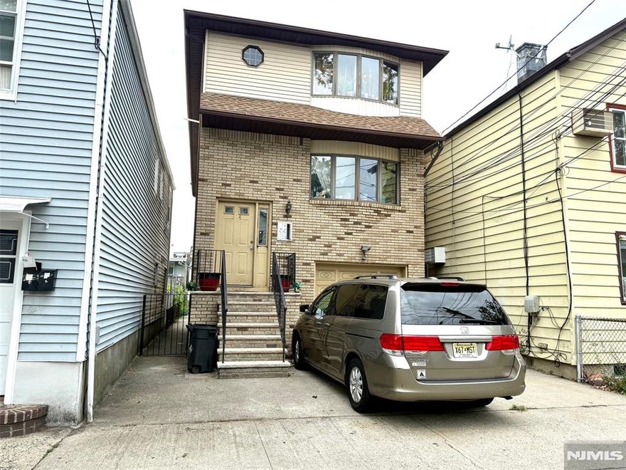 One-bedroom apartment on the ground floor of a 3-family home. Available to occupy on September 1st. Maximum occupancy: 2. Central Air & Forced Hot Air Heat. Ceramic-tiled floors in living room, bedroom & bath. Living room: 17.3'x12.1', Bedroom: 14.5'x9.6', Kitchen: 7.3'x15', Bath: 5.3'x9.4'. No pets, no loud music & no smoking in and near the apartment. Coin-operated washer and dryer in the utility room at the end of the front hallway. One parking space outside the Garage on the right side facing the house included. Tenant shall remove the snow from own parking space. Refrigerator, gas range, range hood & dishwasher provided. Concrete deck to be shared with the other tenants. Tenant is responsible for heat, hot water, gas and electricity. Easy commute to NYC. Close to NJIT, Rutgers, NJPAC, and Prudential Center. Convenient to Turnpike, Parkway, Rt. 280 & Rt. 21. Steps from a massive 5-acre East Newark Riverfront Park. 1.5-months security deposit. Application, tenant credit & background check ($40 per adult), and proof of ability to pay rent required.