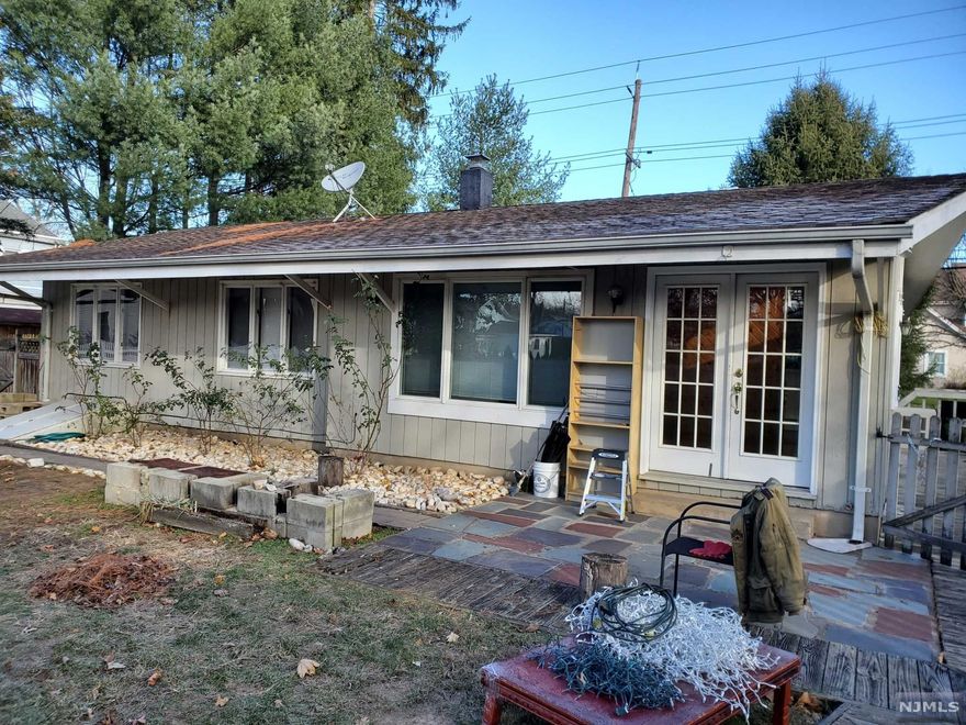 ranch, 3 bed room, 1/5 bath, 2 car detached garage, lot 100x150, partial basement, all hardwood floor through out.