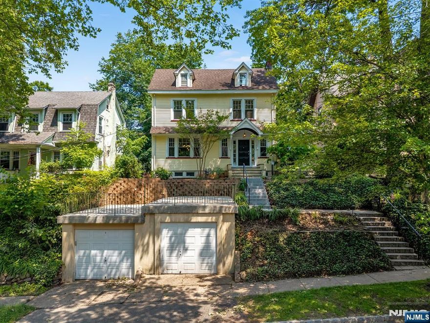 Welcome to 67 Woodland Road, Bloomfield, NJ, where elegance and excitement converge in this stunning home! Situated on a quiet, dead end, tree lined street, this home sits in one of Bloomfield's most coveted neighborhoods. Step into the first floor's open concept design, where the living room's inviting fireplace sets the stage for memorable gatherings. The dining room flows seamlessly into a fully renovated kitchen, dazzling with a grand island, exquisite quartz countertops, and shiny stainless steel appliances. Enjoy the beautifully restored hardwood floors and sunlit four-seasons room. Upstairs, spacious bedrooms and a vast finished walkup attic await your personal touch. Outside, a huge front patio offers breathtaking neighborhood views, while the expansive fenced-in yard with a patio is perfect for private gatherings and outdoor fun!