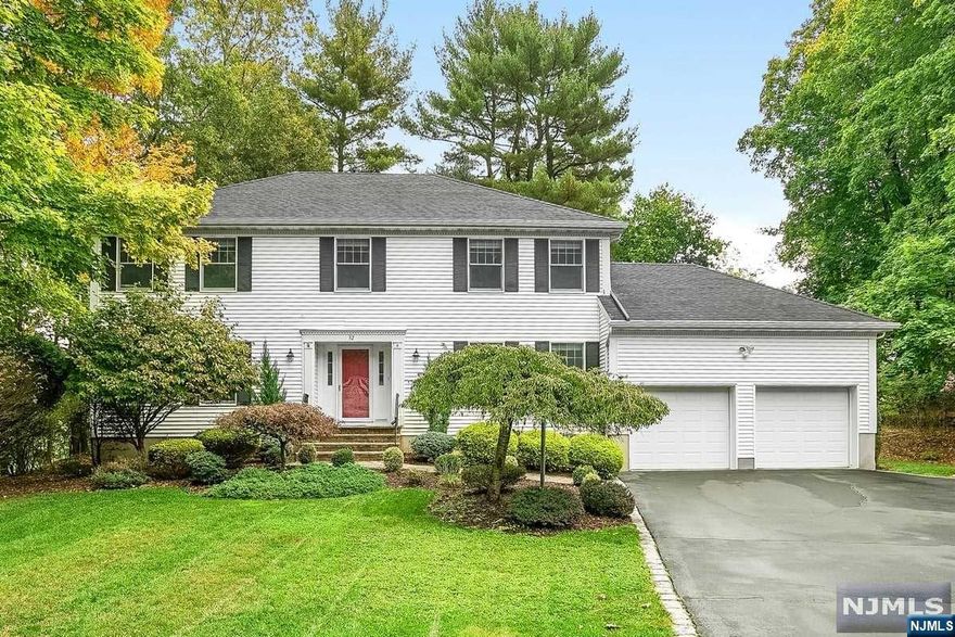 This cul-de-sac located, beautiful colonial embodies the true meaning of home. Spacious and well maintained, you can move right in. On the main level is the open, well laid out eat in kitchen with an oversized pantry, a formal living room (playroom), formal dining, half bath and large laundry room/mudroom. The family room features a floor to ceiling vaulted brick fireplace. On the upper level are 4 full bedrooms including a huge master suite with WIC, and skylit bath with vaulted ceiling. A hall bath with tub and 3 spacious bedrooms (or office space) grace this level. Add another 1381 square feet of space in the ready to finish basement. Huge 2 car garage. Located at the end of a quiet cul-de-sac, steps to Hubbard elementary and close to the infamous Ramsey pool. Ramsey offers a vibrant downtown, 2 different express train stations to NYC and award winning schools.