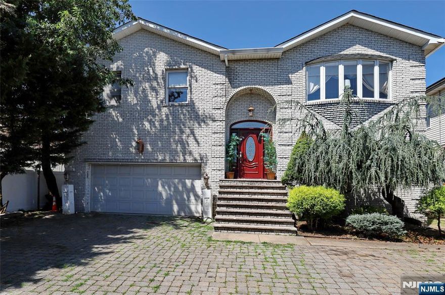 Great 5000 SQFT Bi-Level , Featured 6 bedrooms, 3.5 bathrooms over 55x201 lot built in 2001 . Home offers the perfect blend of space, location, and opportunity. Featuring two full kitchens and a flexible layout, itâ€™s ideal for extended family living, a private in-law suite, or The walk-out ground level leads for summer enjoyment in super spacious yard. Main Level offers living room, formal Dinning room, spacious kitchen, master suite with full bath w/Jaccuzzi , 2 bedrooms, full bath, Family room with/ Fireplace leads to Florida room. Sub Level offer, Family room, full kitchen, bedroom, office, entertaining room, laundry room . Enjoy a quick and convenient NYC commute with easy access to highways, buses s. Plus, youâ€™ll be centrally located near all levels of schools and surrounded by a lively community full of local shops, restaurants, and recreation. Donâ€™t miss this exciting opportunity to own in one of Bergen Countyâ€™s most desirable neighborhoods!