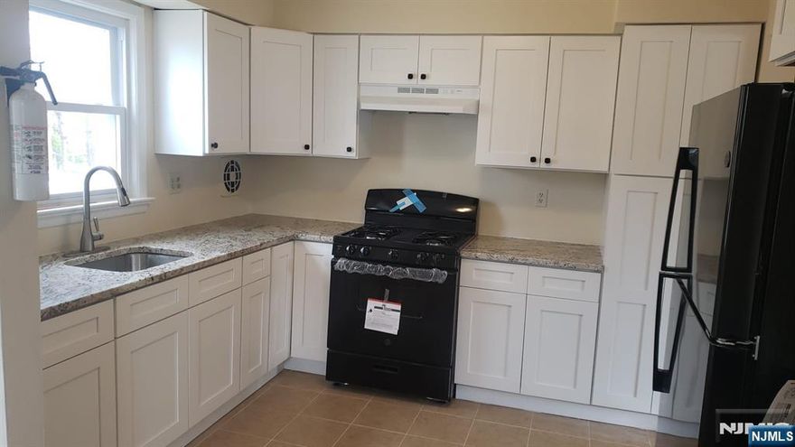 Sunny first floor 3bedroom 2 bth, apartment. new kitchen new baths.....close to schools and transportation.