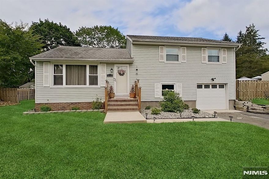 Welcome to this gorgeously renovated 3-bedroom, 1-bath split-level home, perfectly situated on a spacious, well-maintained lot in a peaceful neighborhood. This turn-key, move-in ready property features a brand-new kitchen with granite countertops, stainless steel appliances, and modern cabinetry â€” ideal for both everyday living and entertaining. The newly updated bathroom showcases stylish contemporary fixtures, complemented by new hardwood and tile flooring throughout the home. A brand-new SEPTIC system adds long-term value and reliability. The unfinished basement offers ample storage and great potential to finish for additional living space. Step into your private backyard oasis featuring a 22-foot round above-ground pool and a beautiful gazebo, perfect for relaxing, entertaining, and making summer memories. The large open yard still leaves plenty of room for play, gardening, or expansion. Conveniently located near schools, parks, shops, and major routes, this home offers a perfect blend of comfort, style, and functionality.