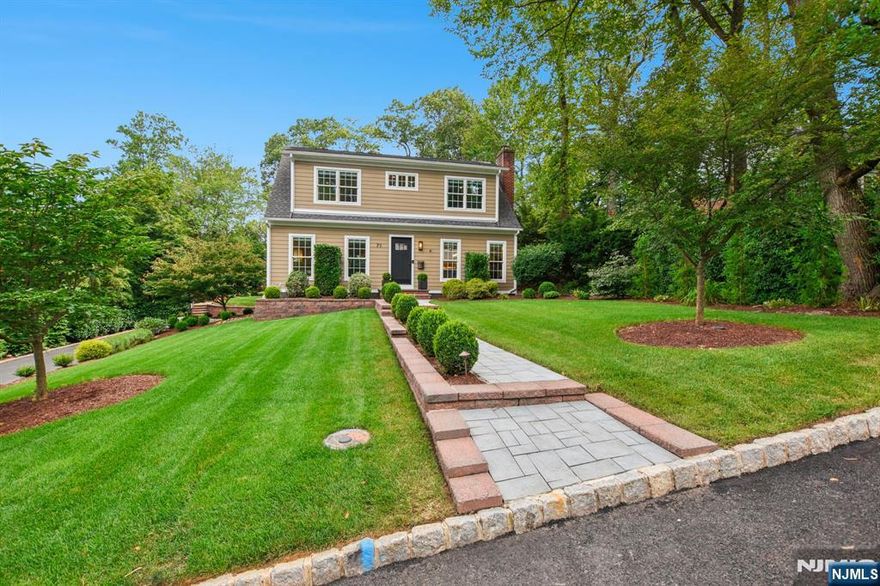 This stunningly gut-renovated Colonial is nestled in the prestigious St. Cloud neighborhood on a picturesque, tree-lined street. Every detail of this home has been thoughtfully curated to offer the perfect blend of modern elegance and timeless charm. Step into a custom chef's kitchen that's truly a showstopper featuring sleek cabinetry, premium appliances, a sprawling island, and a cozy built-in seating area overlooking a backyard that feels like a page out of a magazine. It's an entertainer's dream. The interior is bathed in natural light, thanks to expansive windows throughout. Rich hardwood floors, high-end fixtures, and a seamless flow between rooms create a space that's both sophisticated and inviting. Upstairs, you'll find generously sized bedrooms, including a serene primary suite with an en suite bathroom that feels like a private spa retreat. The additional two bedrooms share a beautifully renovated full bath. Step outside to your very own private oasis a serene, meticulously landscaped backyard that offers peace, privacy, and effortless outdoor living. Additional highlights include: Brand new windows; Custom closets; Smart exterior lighting; Dual-zone heating and cooling; Numerous upgraded smart features throughout. Young roof & newer HVAC. Massive basement that can be finished to your liking. Please note: The garage includes partial HVAC installation. Ample driveway parking is available. Fireplace and flue being conveyed as is. No known issues.