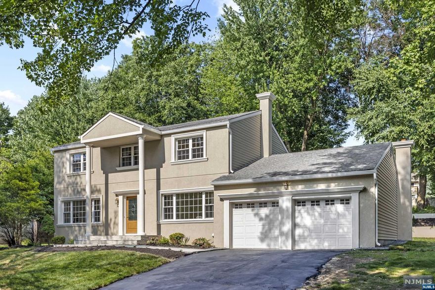 Stunning Colonial Home in Desirable Woodcliff Lake Welcome to 15 Kings Court, a stunning 4-bedroom, 2.5-bathroom colonial home in a sought-after Woodcliff Lake cul-de-sac. This meticulously maintained residence boasts a gourmet kitchen with Quarts countertops and High End Forno Stainless Steel appliances, a huge family room with a WB fireplace, and a formal dining room. The luxurious master suite features a walk-in closet and spa-like ensuite bathroom. The finished basement offers additional living space, ideal for a home gym or media room. Enjoy the beautifully landscaped backyard, complete with a large deck for outdoor dining and relaxation. Additional features include hardwood floors, crown molding, central air conditioning, energy-efficient Pella windows, and an attached two-car garage. Conveniently located near top-rated schools, parks, shopping, dining, and major highways, this home combines elegance, comfort, and modern amenities. Schedule your private showing today!