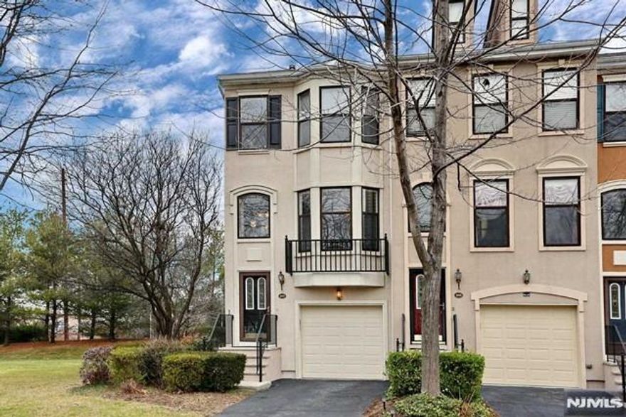 This tri level END unit luxury townhome, set on a quiet cul de sac with a spacious yard, offers an exceptional blend of modern design and thoughtful renovations throughout. The main level features a formal dining room with stunning custom woodwork, a beautifully updated kitchen with rich wood cabinetry, granite countertops, and abundant cabinet and storage space, plus a bright, sun filled living room with a cozy gas fireplace. A convenient powder room completes this level. Upstairs, the expansive primary suite includes two closets and a private primary bath. The second bedroom is generously sized with two closets and direct access to the second full bath. A conveniently located laundry area adds ease to everyday living. The lower level provides a large, flexible space ideal for a bedroom, home office, or both, along with a third full bath, direct garage access, and walk out access to a private patio and impressive yard perfect for entertaining or relaxing. End units rarely become available and this prime location makes it even more special!