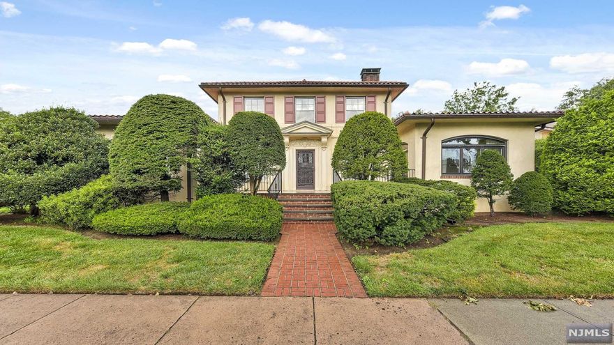 Mediterranean Villa in Clifton center offering 4 Bedrooms, 2.2 baths, hardwood floors and a finished basement. Enter into this majestic home with sweeping staircase and detailed architectural design of old world charm throughout. The grand Living Room features custom millwork and oversized wood-burning fireplace opening into a sunroom/ music room. A banquet sized Dining Room leads to conservatory with panoramic views of the property. An oversized eat-in Kitchen with separate breakfast area provides access to yard and driveway. Main floor Bedroom/Office and powder room. The large Master Suite has 2 closets and en-suite full bath with tub and shower, 2 additional Bedrooms and main Bath. A huge basement that is partially finished has outside access, laundry, utility, game room with fireplace, bar area ( pool table included). Home features plenty of storage, hardwood floors, oversized two car garage, manicured gardens and more! Convenient location to highways schools and shopping.