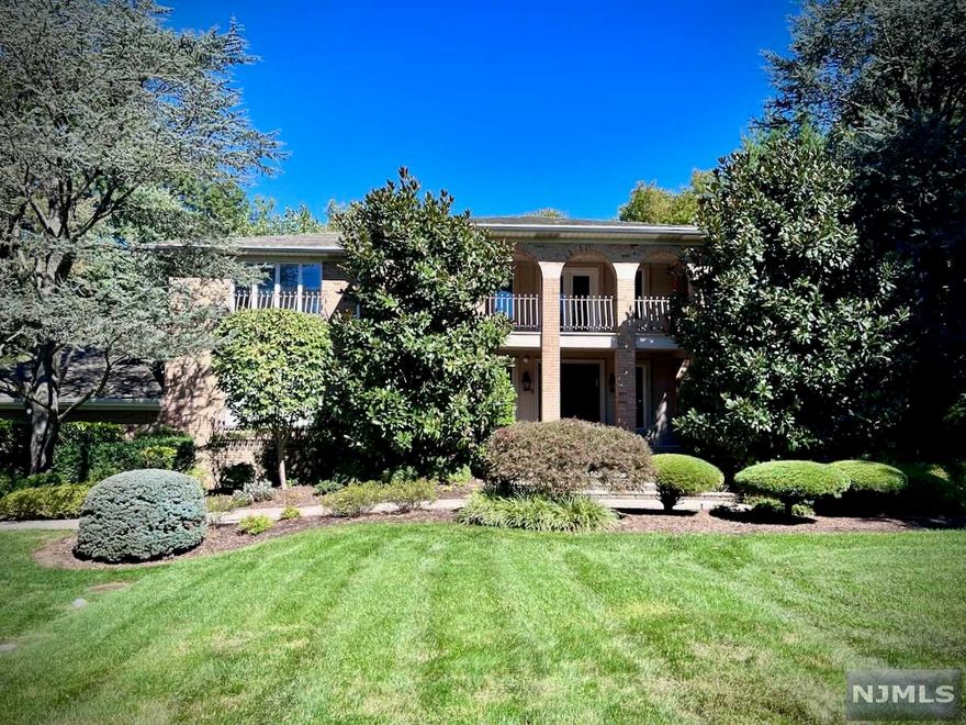 Fabulous colonial with major expansion and gut-renovation 2010 by Liberty Gate Construction on one acre on a beautiful cul-de-sac street in prestigious Alpine. Huge gourmet designer kitchen (hi-end appliances include Sub-zero, Miele, Wolf). Expanded first floor also offers a library/office & a guest suite w/bath in addition to generously-sized living room and dining room. The master suite boasts a sitting rm, two walk-in closets, & a beautiful marble bath. The fully finished expanded lower level offers another family rm/recreation space, a gym, & a guest suite. The exterior: a 7 year old septic system and the roof was replaced 7 years ago with new gutters and leadersRenovated again in 2013. Among the new updates, the garage was expanded to fit 5 cars and an elevator was installed which services all floors.