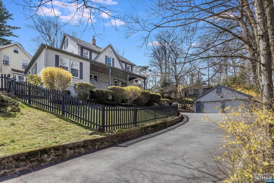 Perched on a hill and along a private road that serves only 4 other properties, this charming farmhouse offers a unique blend of privacy and contemporary living. With an open floor plan, the well appointed kitchen, featuring modern amenities, leads to the dining and living areas flanked by windows that offer abundant light and beautiful views. 3 bedrooms provide cozy retreats, while the 4th primary is a spacious oasis complete with a walk-in closet. The second-floor laundry makes life so much easier! Three bathrooms, one on the main level, a stylish new bathroom on the second and a third located in the basement near the workout room offer maximum convenience. Outside, the farmhouse charm continues with a lovely porch, perfect for enjoying your morning coffee. A partially fenced yard accommodates many activities and the recently re-sealed patio is the perfect place to entertain friends and family.