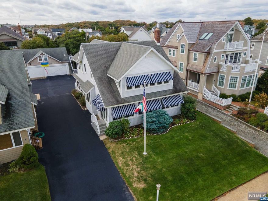 It doesn't get better than this! This is the home and location you've been waiting for. Rarely does a property this close to the ocean become available in a town as sought after as Sea Girt. Just a few doors from the beautiful Sea Girt beaches, no streets to cross, beach access as you reach the boardwalk. Well maintained Victorian, traditional sea shore home. Four bedrooms, wrap around enclosed back porch that leads to the deck. Front porch is also enclosed, as is the upstairs porch with view of the ocean, just down the street. Apartment over the garage with kitchenette and full bath. Bright, sunny and oh so welcoming, this is the house and location of your dreams. Don't miss out on the rare, ocean block opportunity.