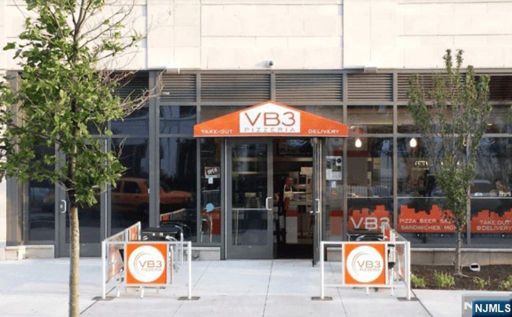 Photo of 445 Washington Boulevard, Jersey City, NJ 07310 (MLS # 25038246)