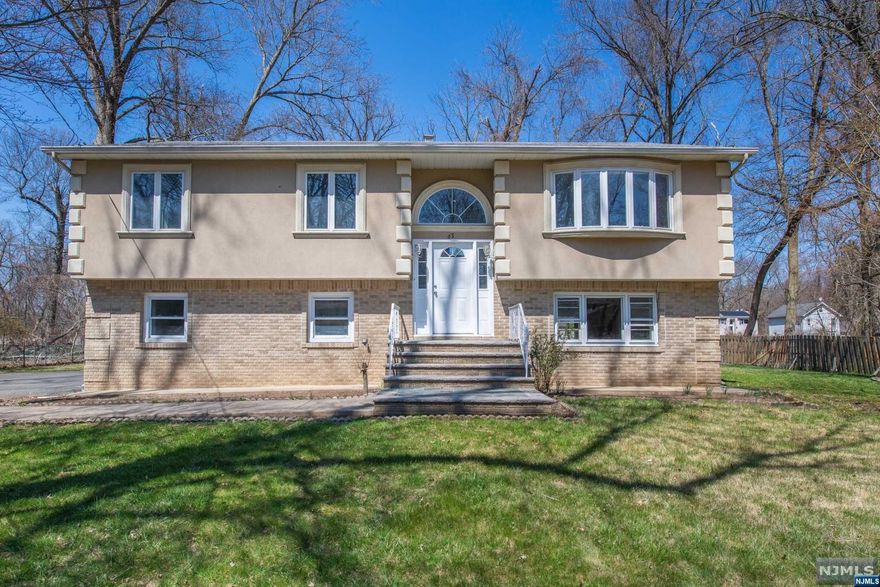 Enjoy all that Wayne has to offer! Close to Shops, Restaurants, Churches, and Highways. 5 minute drive to Willowbrook Mall. Renovated 4 bedroom, 2 full bath Raised Ranch. Upper level has 3 bedrooms kitchen, dining, and living area. ground level offers an additional bedroom, bathroom and laundry. Large backyard and a brand new deck.