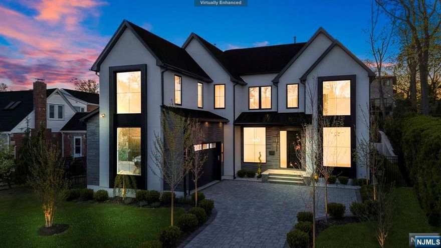 STATE-OF-THE-ART MASTERPIECE built by Bergen County's TOP BUILDER! FEATURING 7 bd 9.5 bath&boasts almost 8,700 sqft on all levels. Set on a perfectly flat, professionally landscaped lot w a spacious backyard w inground POOL, outdoor patio&kitchen. Absolutely no expense spared! This EXQUISITE home showcases elegance and sophistication in every detail including 11ft ceilings on the 1st fl, 10ft sliding glass patio doors, white oak wood floors, heated floors in all baths! 1st fl boasts spacious entry foyer, fam room&din room, library, Chef's Gourmet Kitchen w oversized prep island, professional grade SUBZERO/WOLF appliances, 1st fl guest suite, pool bath, powder room&oversized 2car garage. 2nd fl offers LUXURY primary suite w oversized custom furniture grade WICs&SPA like bath w oversized stand up shower & free standing tub, 4 en-suite bds&laundry. The DREAM basement boasts tons of room for entertaining, HOME THEATER, GYM, SAUNA w bath/steam shower, MASSAGE room, WET bar, bd&bath.