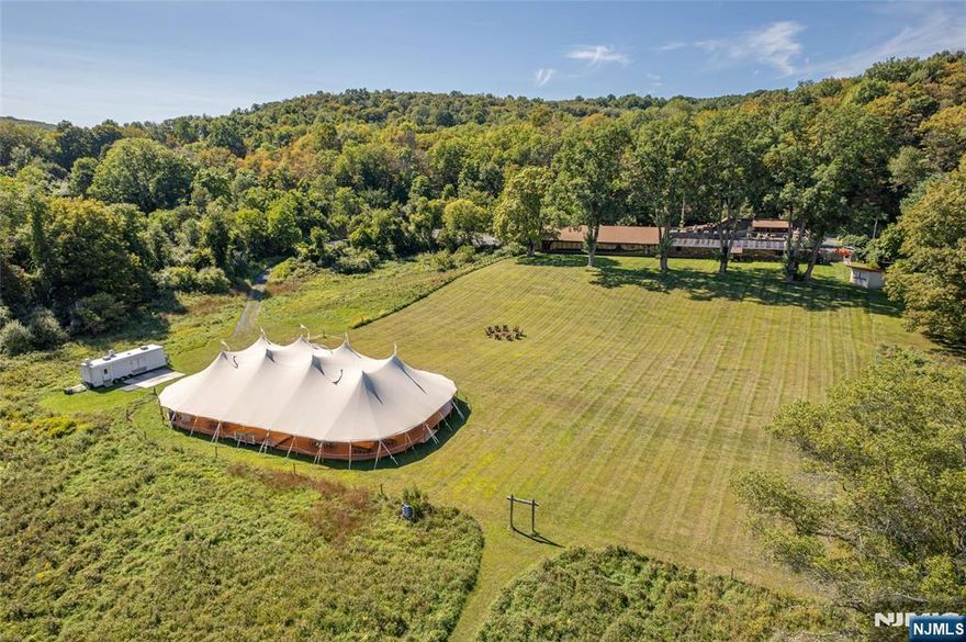 Iconic NJ Restaurant Destination for sale. Owned by the same family since 1949, the restaurant and event facility has been a dining destination for generations. Large operating restaurant business and event business that has been thriving for decades. Over 1000 feet of frontage on the flat brook river. Surrounded by the 65,000- acre Delaware Water Gap National Recreation Area, this property is a secluded sanctuary with limitless potential. The existing structure offers ample space to build out guest rooms, creating a boutique inn, a premier corporate retreat, or a wedding venue. Open fields and beautiful views, ideal for equestrian use as well. World-class hunting, plus swimming and fishing on the adjacent Flat Brook.