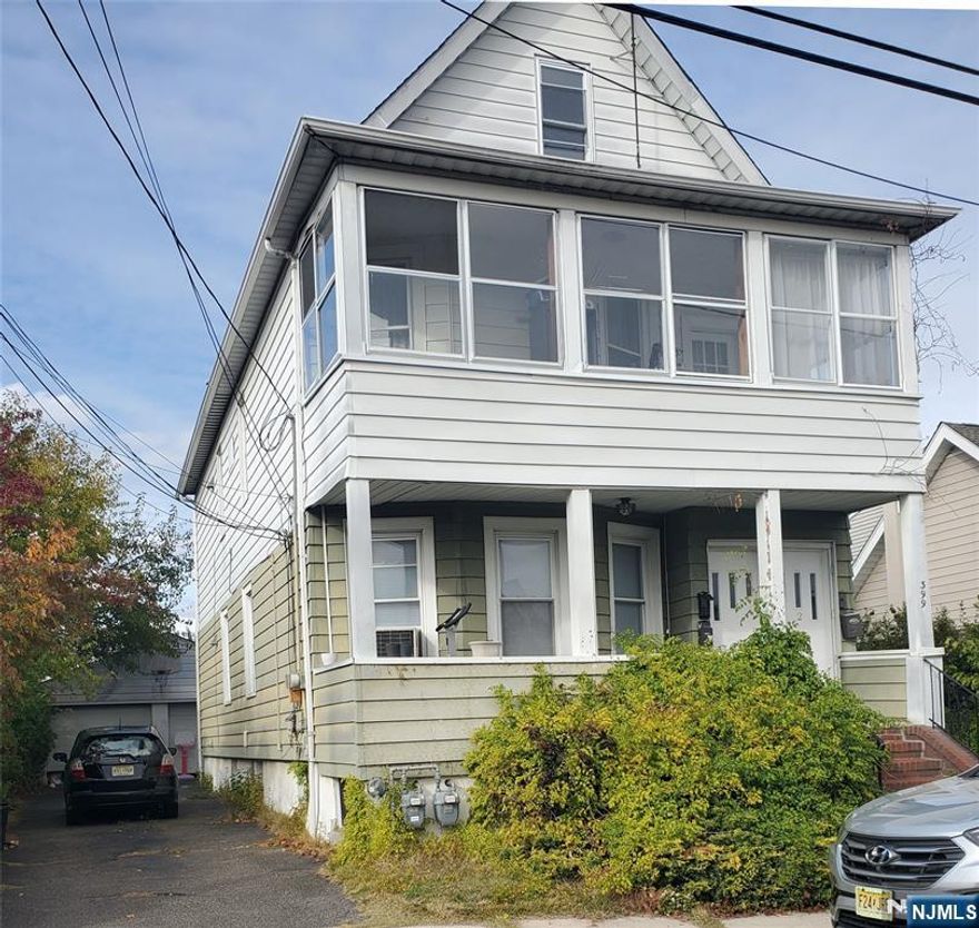 Step into this spacious, freshly painted and updated, move-in ready 3-bedroom, 1-bath apartment located on the first floor of a quiet residential, non-owner occupied two-family home in Garfield. This bright and comfortable unit features an eat-in kitchen, living room, three bedrooms and a full bathroom. Additional highlights include freshly painted, laminate flooring, central air, gas heat, laundry with W/D and storage provided in basement, separate utilities. Tenant responsible for all utilities except water. Conveniently situated near parks, shopping, and dining, this home is just minutes from Plauderville Train Station, offering an easy commute to Manhattan. No pets, no smoking and on-street parking only. On Street Parking Permit required by City of Garfield. Use of side-yard for 1st floor tenant. Requirements are: Credit check with 700+ score, employment and annual income verification, ID, application. First $150 of repairs is tenant responsibility.