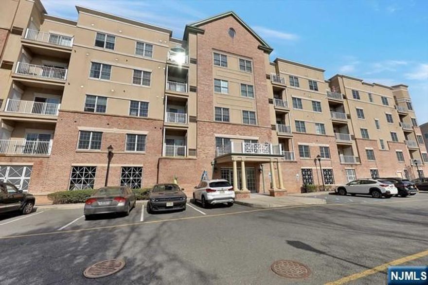 Stunning top-floor corner unit located at Windsor Park, offering 1,288 sq. ft. of bright and spacious living. This builderâ€™s unit features breathtaking panoramic views of the golf course and lake, creating a truly serene setting. The sun-filled living room boasts high ceilings and oversized windows, enhancing the open and airy feel. The modern open kitchen is beautifully updated with quartz countertops and stainless steel appliances, complemented by new hardwood floors throughout. This home offers 2 bedrooms and 2 full baths, including a luxurious primary suite with a soaking tub, separate shower, and marble double sinks. Enjoy the convenience of a full-size washer and dryer in-unit and step out onto your private balcony to take in the spectacular views. Additional features include 1 indoor garage parking space and ample guest parking. Residents also enjoy access to a clubhouse with a cozy fireplace, kitchen/party area, and fitness center. Ideally located near NYC bus transportation, shopping, and cafés, with easy access to Route 4, the George Washington Bridge, I-80, and I-95â€”perfect for commuters.