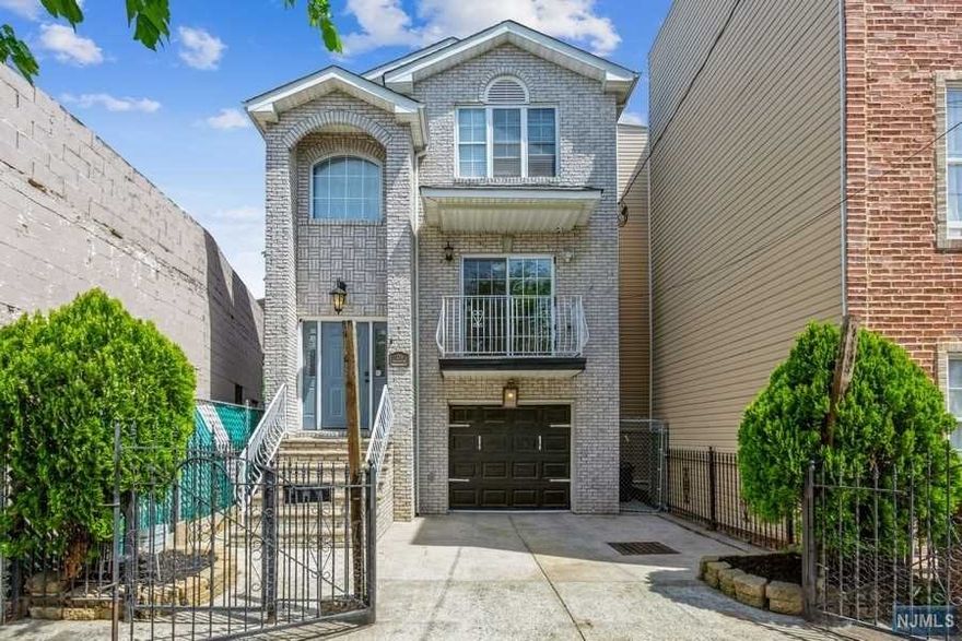 Large, recently constructed single family property in Newark's sought after North Ward.-; This home features 3 bedrooms, 2 full baths and 2 half baths.-; On the ground level you'll find the media room (or home office), a half bath, the garage and sliding doors to the private outdoor patio.-; The 2nd level contains an open concept family room/dining room/large eat-in kitchen (with stainless steel appliances) + a laundry room.-; In addition there is a separate living room and 1/2 bath.-; The 3rd level features 3 generously sized bedrooms and 2 full baths.-; The home is in great condition and you can simply pack your bags and move right in. This home is a commuter's dream with a 7 minute walk to the Bloomfield Avenue Light Rail Station which whisks you to Newark Penn Station in 10 minutes.-; 45 minutes to New York Penn Station or the World Trade Center.-; 1 block from Branch Brook Park and the shops and services lining Bloomfield Avenue. NOTE: This is a SINGLE FAMILY home.