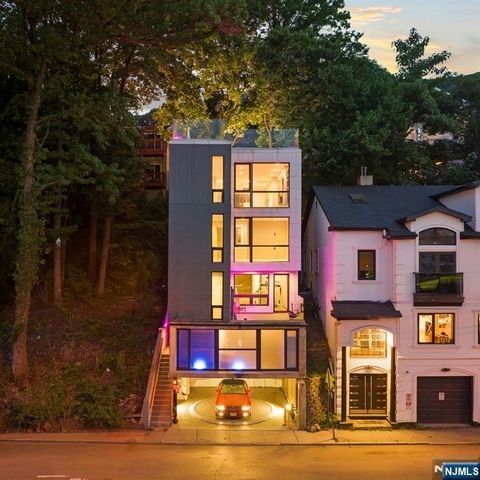 Photo of 1076 River Road, Edgewater, NJ 07020 (MLS # 25026584)