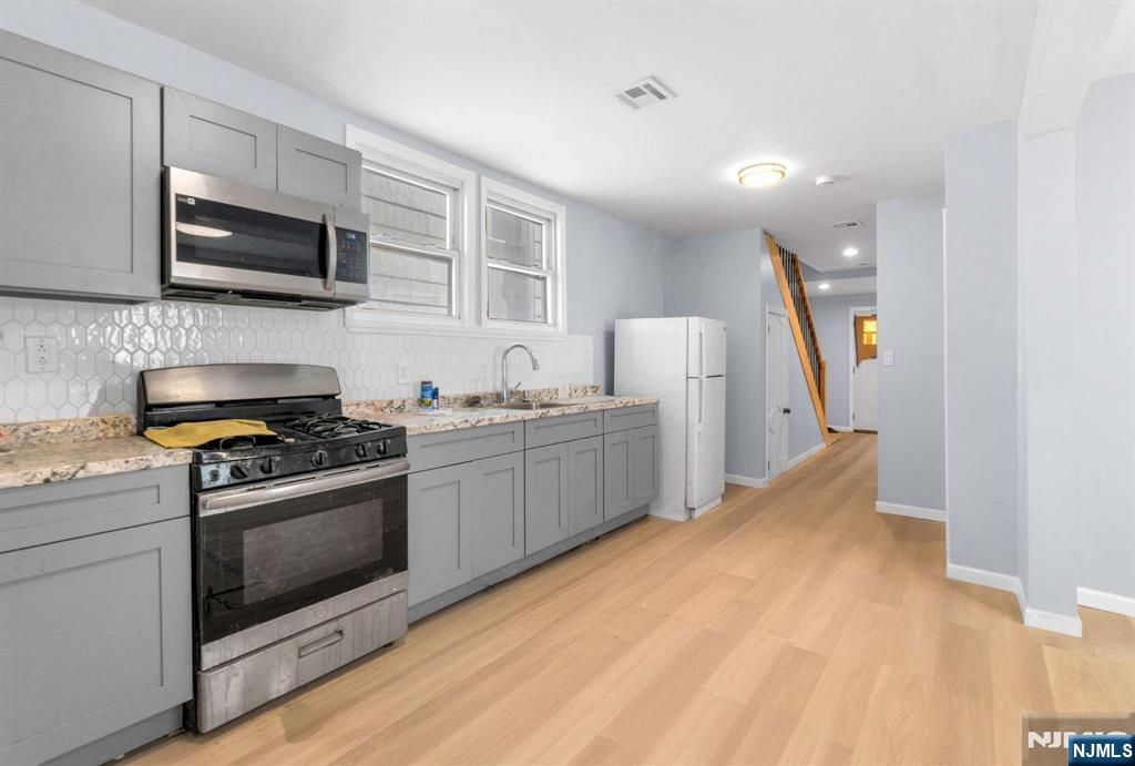 Photo of 34 Tichenor Terrace, Irvington, NJ 07111 (MLS # 26004358)