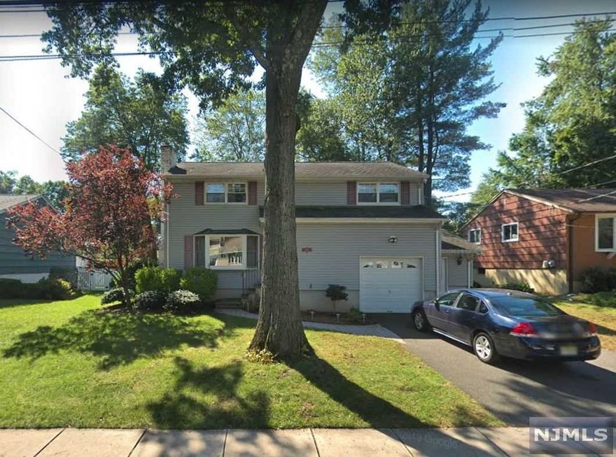 Welcome Home to This Lovely Split Level Home, Located On A Quiet Dead End Street, In The Great Town of Waldwick! Offering Living Room with Fireplace, Large Eat In Kitchen with Pantry Closet, Dining Room with Sliding Glass Doors to Large Deck, Powder Room, Large Bedroom with Large Closets and Full Bath. Upstairs Finds the Primary Bedroom with Two Closets, 3 Additional Bedrooms and Full Bath with Linen Closet. Central Air, Hardwood Floors, 1 Car Attached Garage, Paver Front Walk. Make This Home Your Own! Must See!