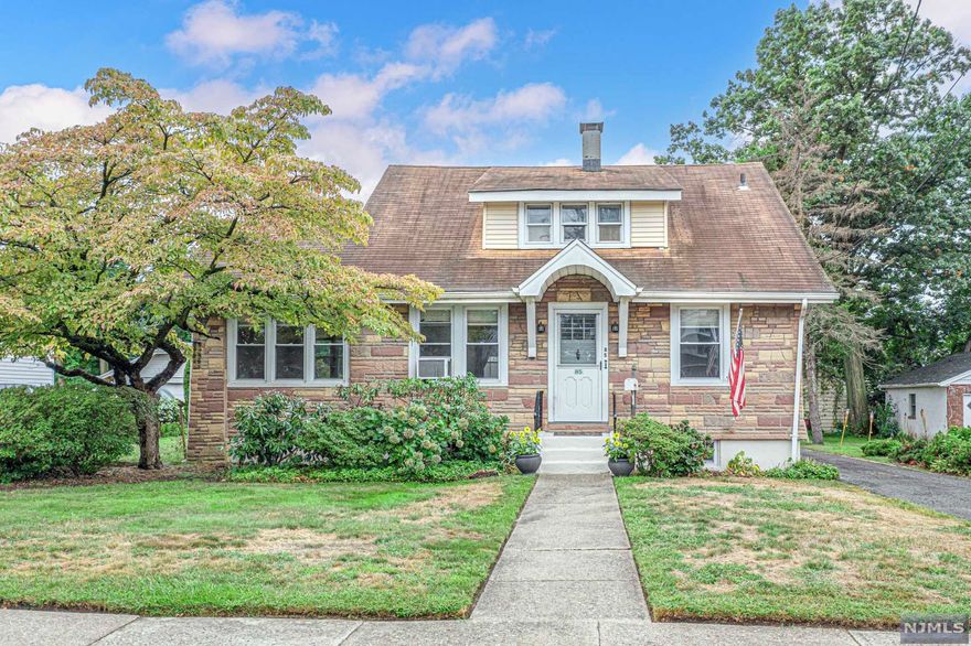 Located on a dead-end street, no flood zone and within walking distance to grammar school and rec center with turf field & playground, sits this charming and surprisingly spacious cape cod style home! With nearly 1650 square feet on a 75x125 lot, features include beautiful Chestnut wood moldings, security system, high ceilings, wood-burning fireplace, h/w water baseboard heat, formal dining room w/butler door to kitchen, den/office, formal living room, kitchen w/window over sink, newer dishwasher & gas stove/oven, oversized screened in porch and 2 bedrooms on the first floor. Upstairs are 2 large bedrooms both w/double closets, full bath and walk-in cedar closet. Basement is full, unfinished with potential to finish along w/rough plumbing. Huge bonus is the detached 2-car garage w/auto opener! Close to NYC bus, shopping mall w/movie theater, eateries, & more. Less than 20 miles from NYC and close to all major highways. Come see the opportunity here and start making memories today
