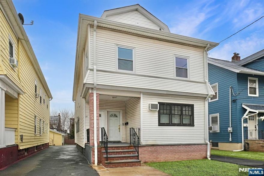 Well-maintained two-family home located on a residential street in Bloomfield. The first and second floor units each offer a spacious living room, eat-in kitchen, full bathroom, and three bedrooms, providing flexible living and income potential. The top floor features two additional rooms and a full bath ideal for extended living space, home office, or guest use. The property also includes a finished basement, detached garage, and private driveway for convenient off-street parking. Steam heat throughout. Conveniently located near local shops, dining, parks, and transportation. A great opportunity for owner-occupants or investors alike.