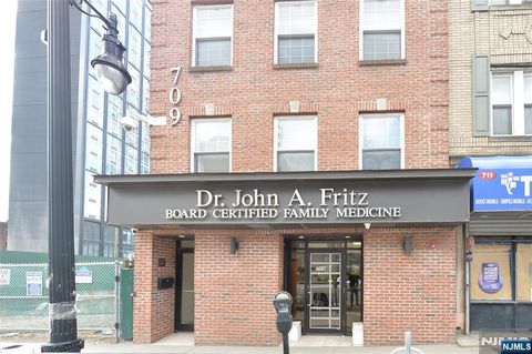 Photo of 709 Newark Avenue, Jersey City, NJ 07306 (MLS # 26010651)
