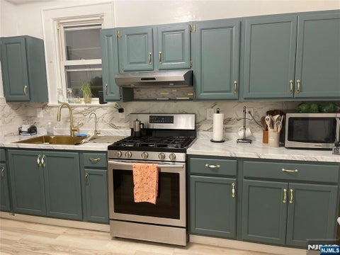 Photo of 16 Hazel Pl, Irvington, NJ 07111 (MLS # 26032948)