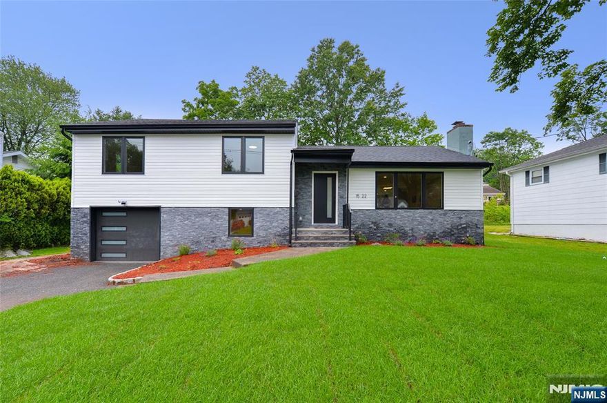 Welcome to this newly built, expanded Split-Level gem nestled in the heart of Fair Lawn, where luxury living meets timeless charm. This beautifully designed home features a sun-drenched open floor plan, beginning with a gracious living room anchored by a cozy fireplace. The gourmet eat-in kitchen impresses with a large center island, gleaming granite countertops, and pristine white cabinetry, flowing seamlessly into the dining area and airy family room with access to a professionally landscaped backyard and patio, perfect for entertaining. Upstairs, discover two spacious bedrooms, a chic full bath, a laundry room with hookups, and a serene primary suite boasting double closets and a spa-like en suite. The ground level offers a private fourth bedroom and full bath, ideal for guests. A fully finished basement adds a spacious rec room and utility space. Located in one of Bergen Countyâ€™s most beloved towns, near top schools, NYC transit, and vibrant community life, this is the one youâ€™ve been waiting for.