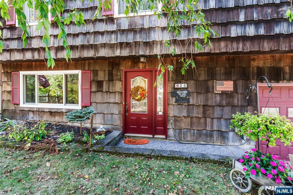 Photo of 25 Longhouse Drive, West Milford, NJ 07421 (MLS # 25035686)